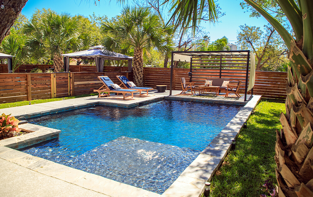 Designing custom backyard swimming pool environments