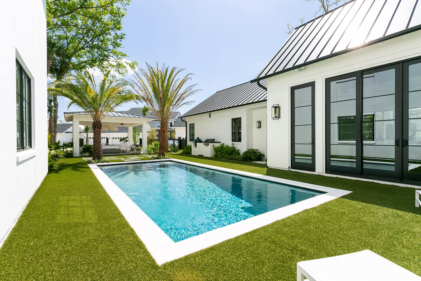 Custom gunite pool designed around how the family uses the space